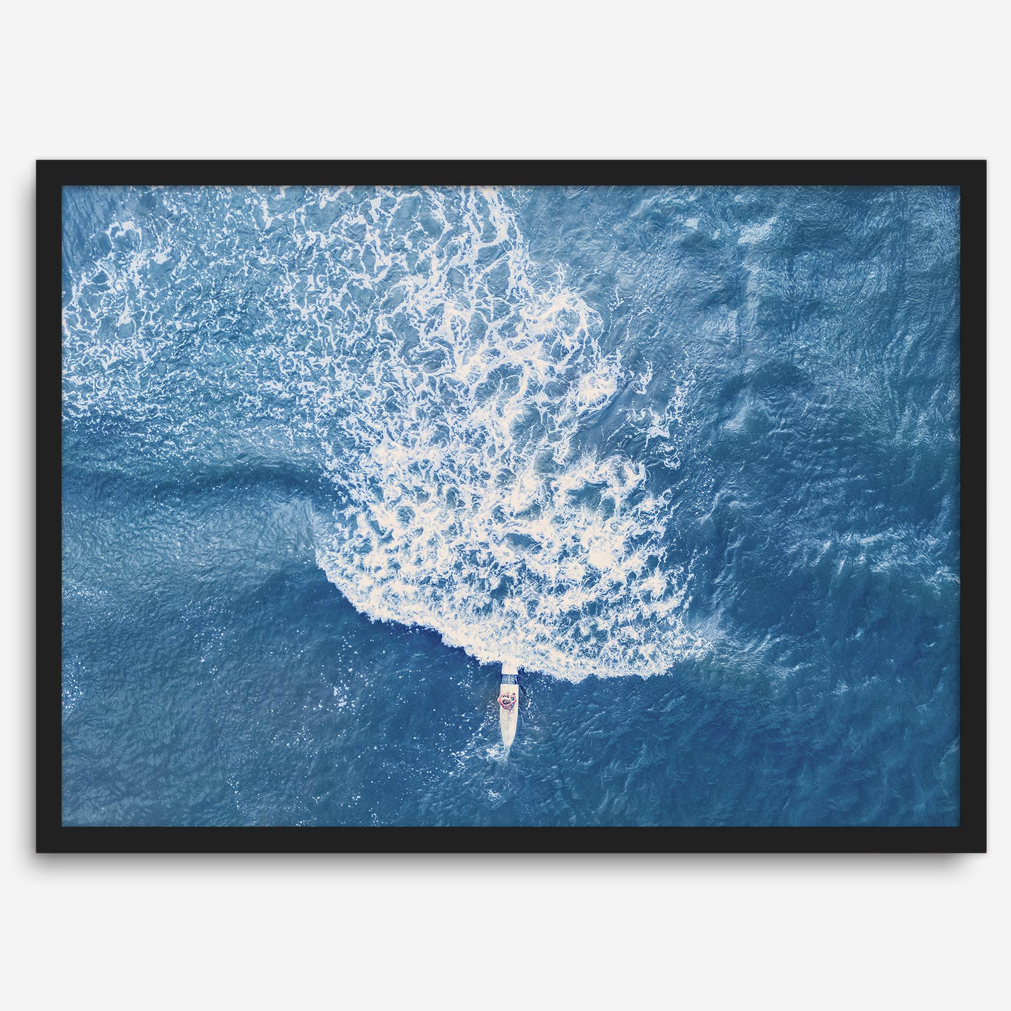 Ocean wave aerial photography print featuring a surfer in Kauai Hawaii with modern coastal styling
