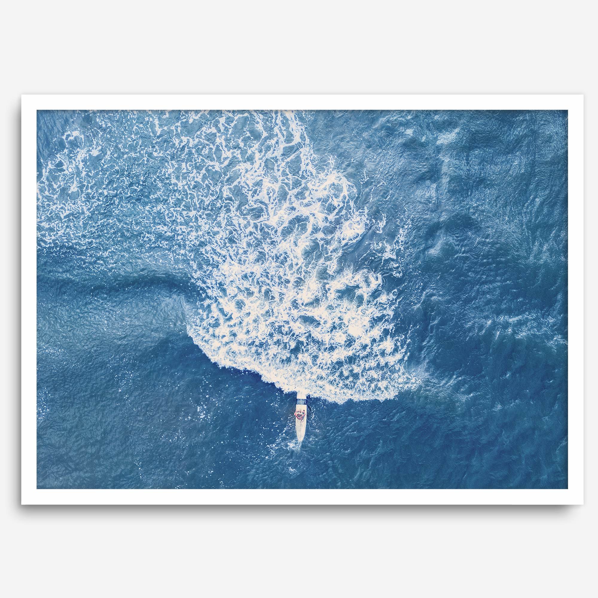 Ocean wave aerial photography print featuring a surfer in Kauai Hawaii with modern coastal styling