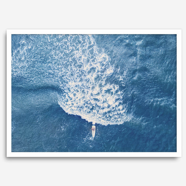 Ocean wave aerial photography print featuring a surfer in Kauai Hawaii with modern coastal styling