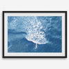 Ocean wave aerial photography print featuring a surfer in Kauai Hawaii with modern coastal styling