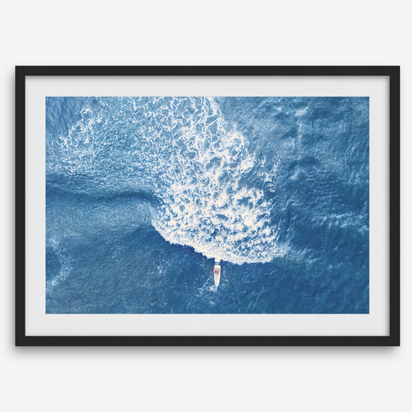 Ocean wave aerial photography print featuring a surfer in Kauai Hawaii with modern coastal styling