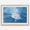 Ocean wave aerial photography print featuring a surfer in Kauai Hawaii with modern coastal styling