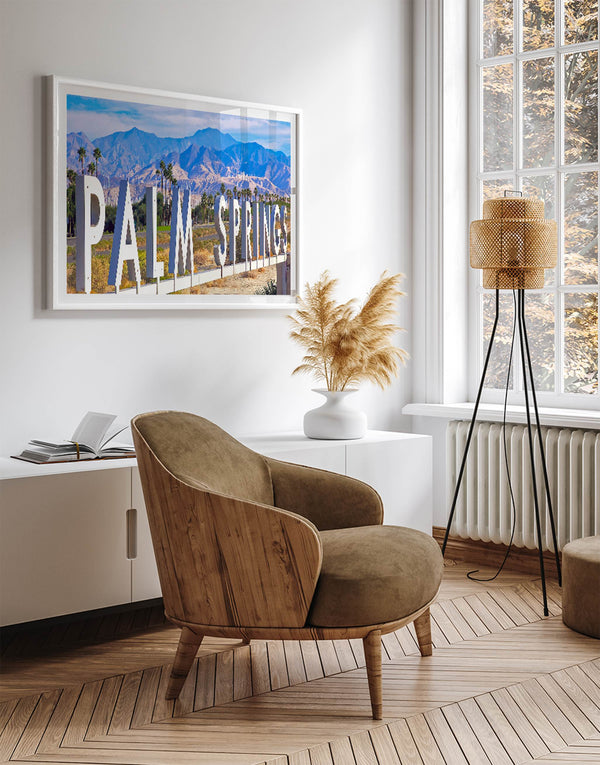 Panoramic Palm Springs sign artwork featuring palm trees and mountain views in California