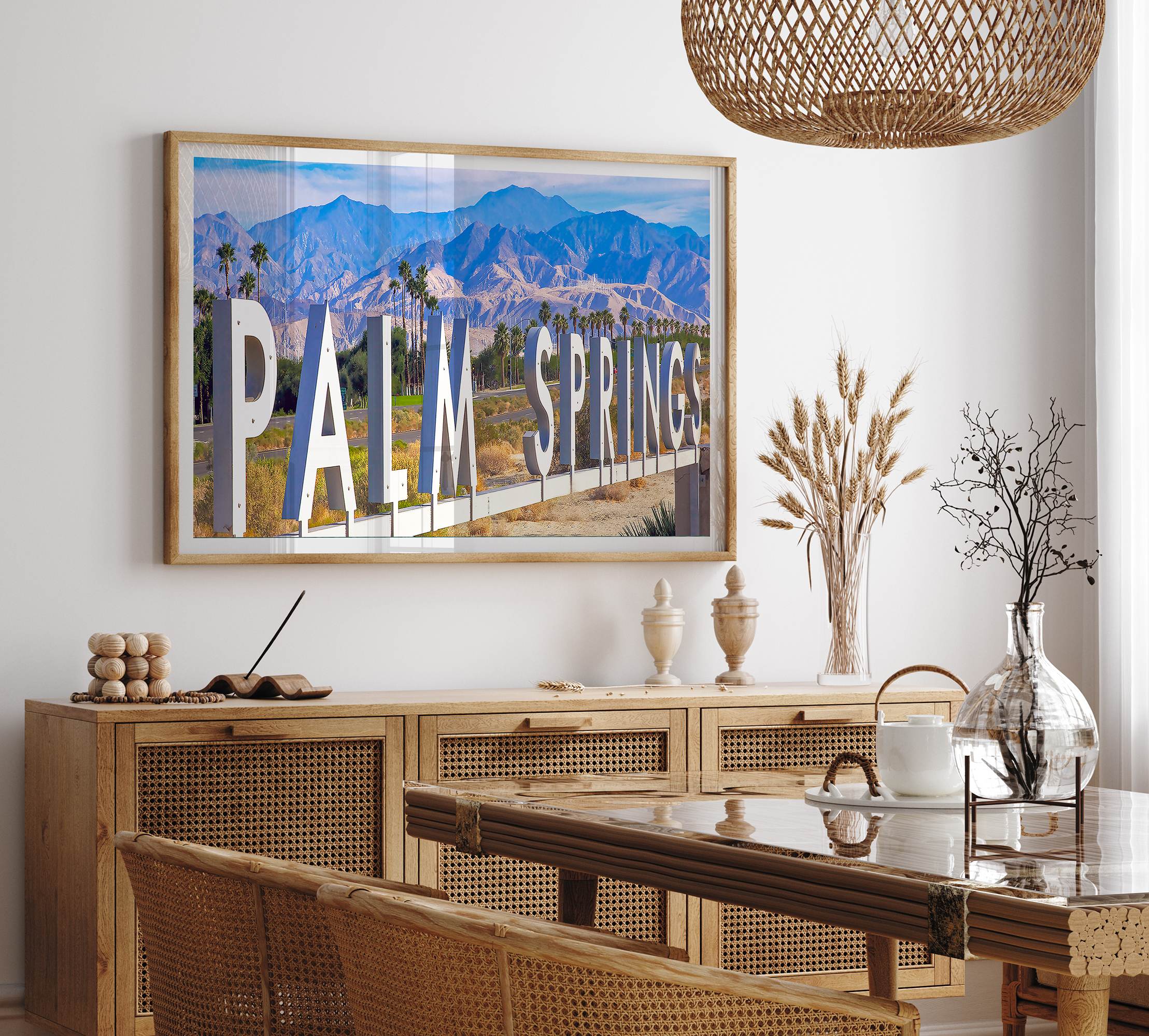 Panoramic Palm Springs sign artwork featuring palm trees and mountain views in California
