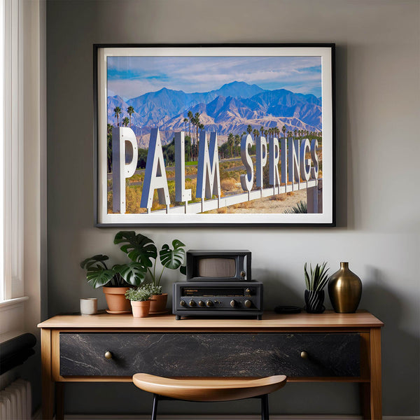 Panoramic Palm Springs sign artwork featuring palm trees and mountain views in California