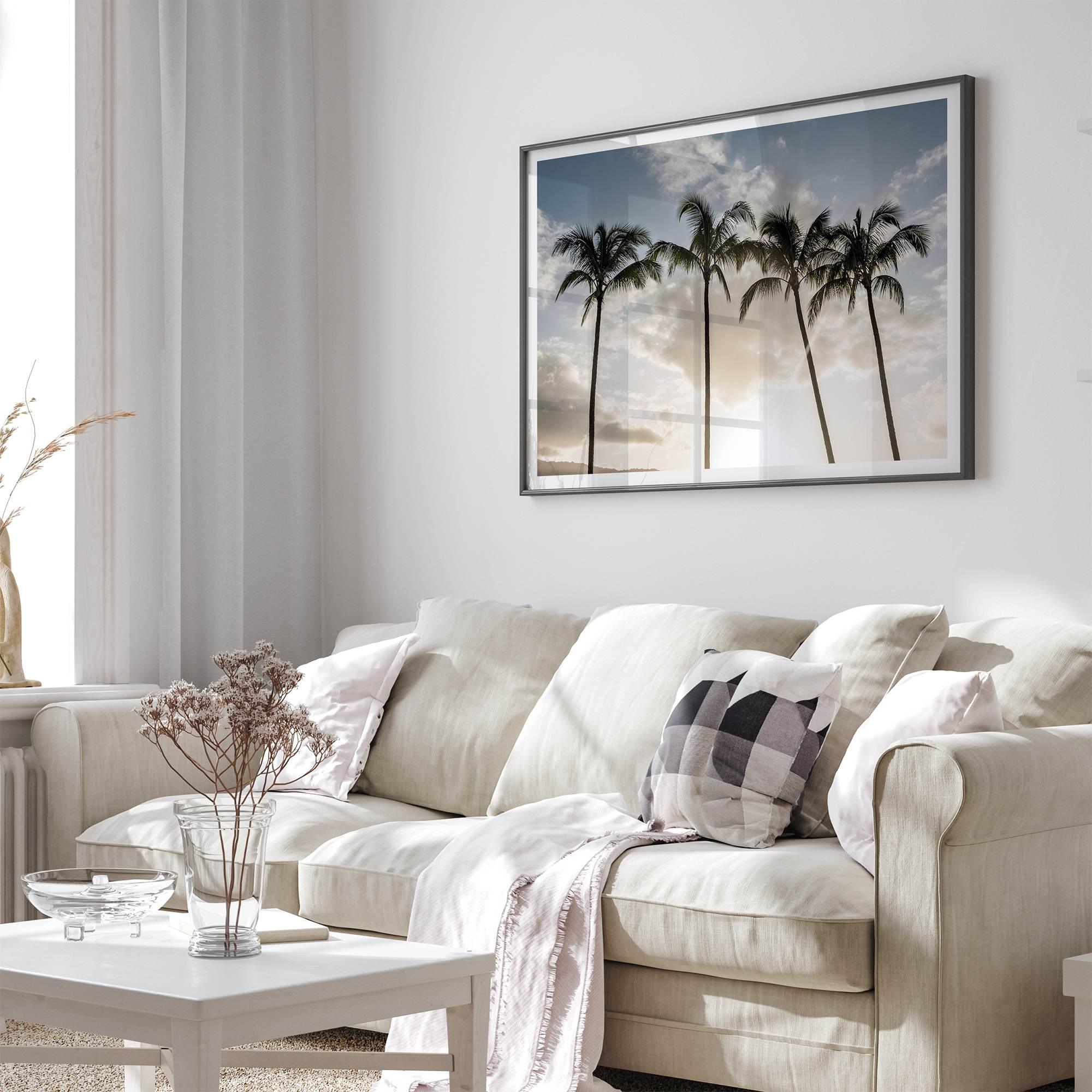 Sunset over palm trees in Kauai with golden sky and tropical landscape for wall decor