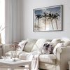 Sunset over palm trees in Kauai with golden sky and tropical landscape for wall decor