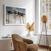 Sunset over palm trees in Kauai with golden sky and tropical landscape for wall decor
