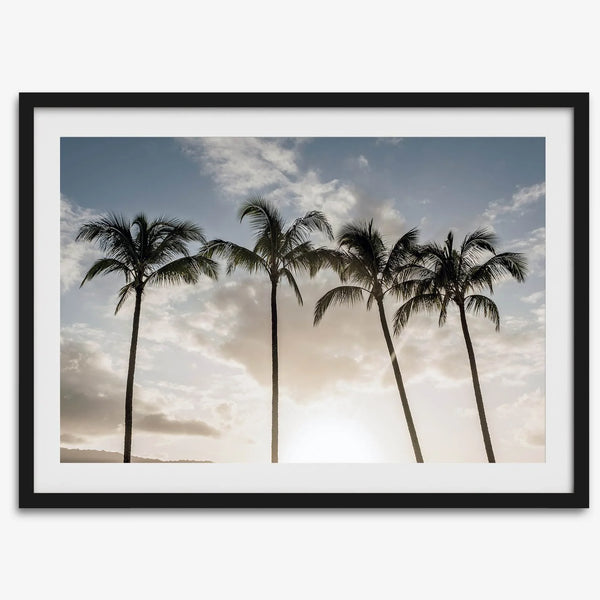 Sunset over palm trees in Kauai with golden sky and tropical landscape for wall decor