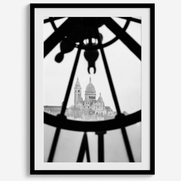 Black-and-white Paris wall decor showcasing the Sacré-Coeur Basilica framed by the Musée d’Orsay clock.