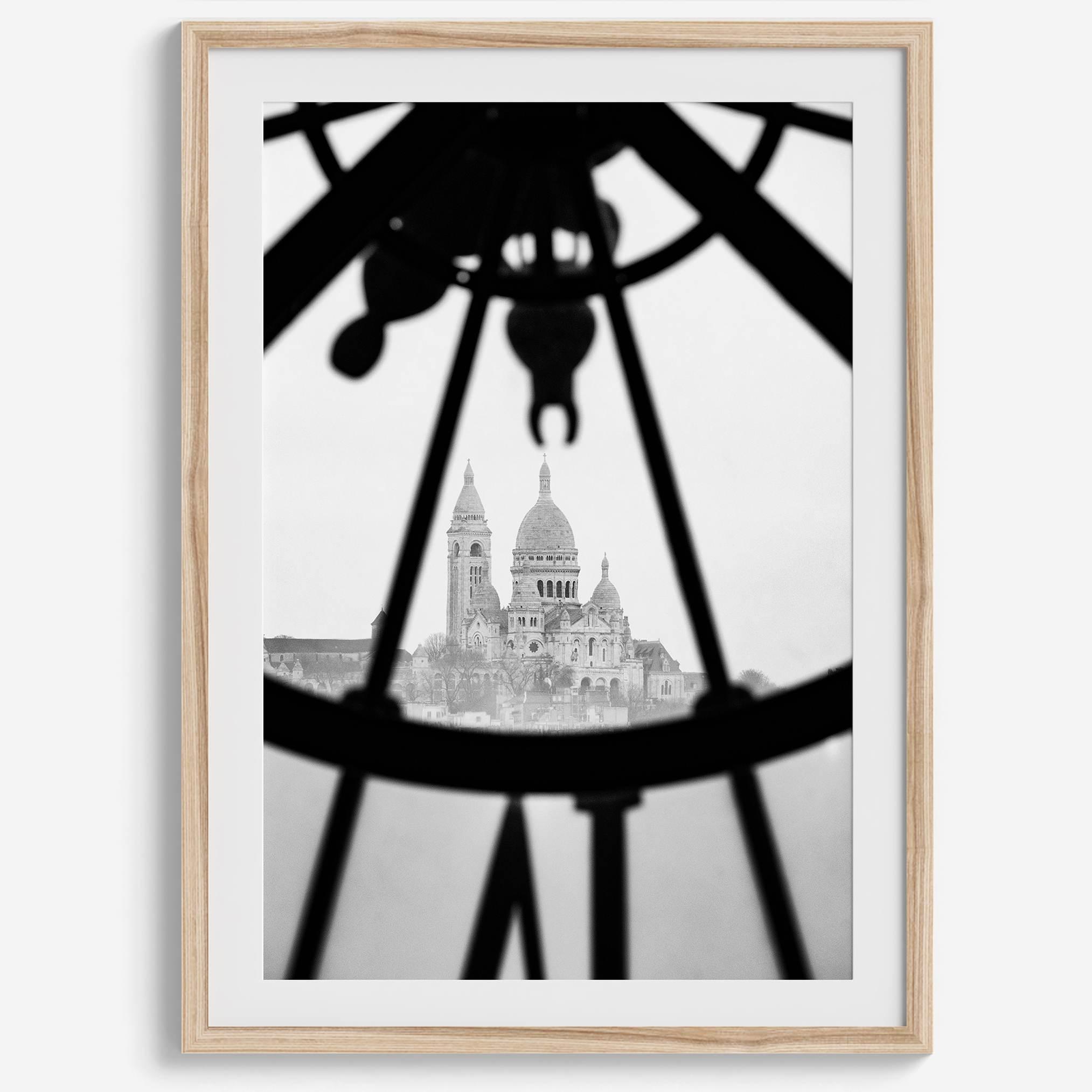 Black-and-white Paris wall decor showcasing the Sacré-Coeur Basilica framed by the Musée d’Orsay clock.