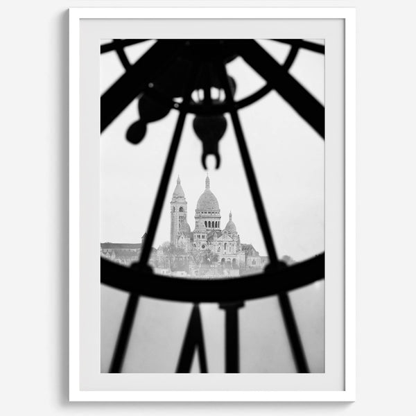Black-and-white Paris wall decor showcasing the Sacré-Coeur Basilica framed by the Musée d’Orsay clock.