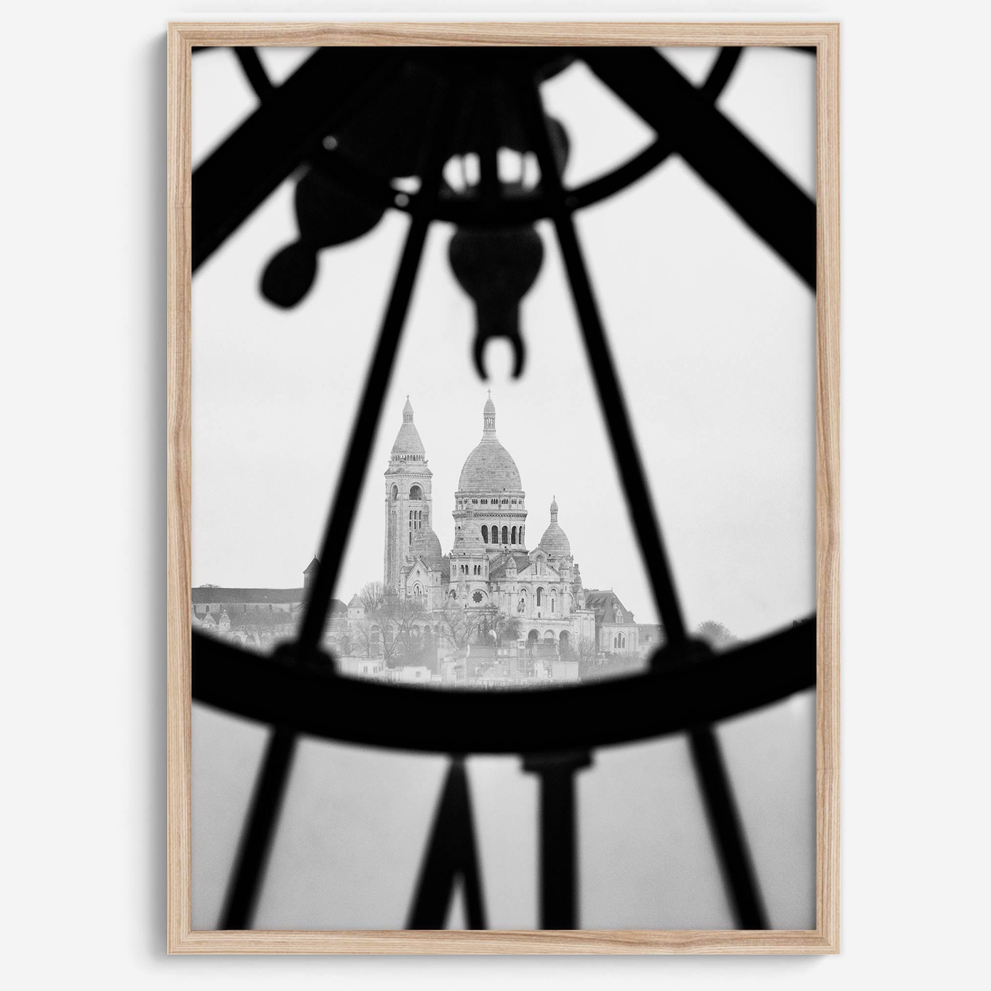 Black-and-white Paris wall decor showcasing the Sacré-Coeur Basilica framed by the Musée d’Orsay clock.