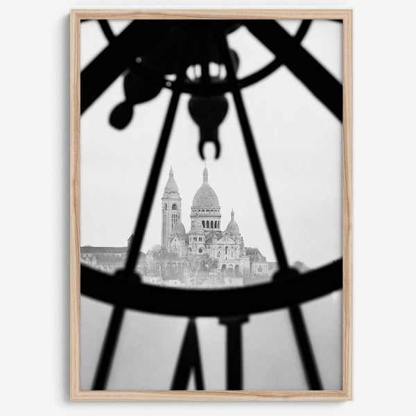 Black-and-white Paris wall decor showcasing the Sacré-Coeur Basilica framed by the Musée d’Orsay clock.