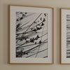 Minimalist black and white floral triptych with abstract plant silhouettes and delicate botanical linework.