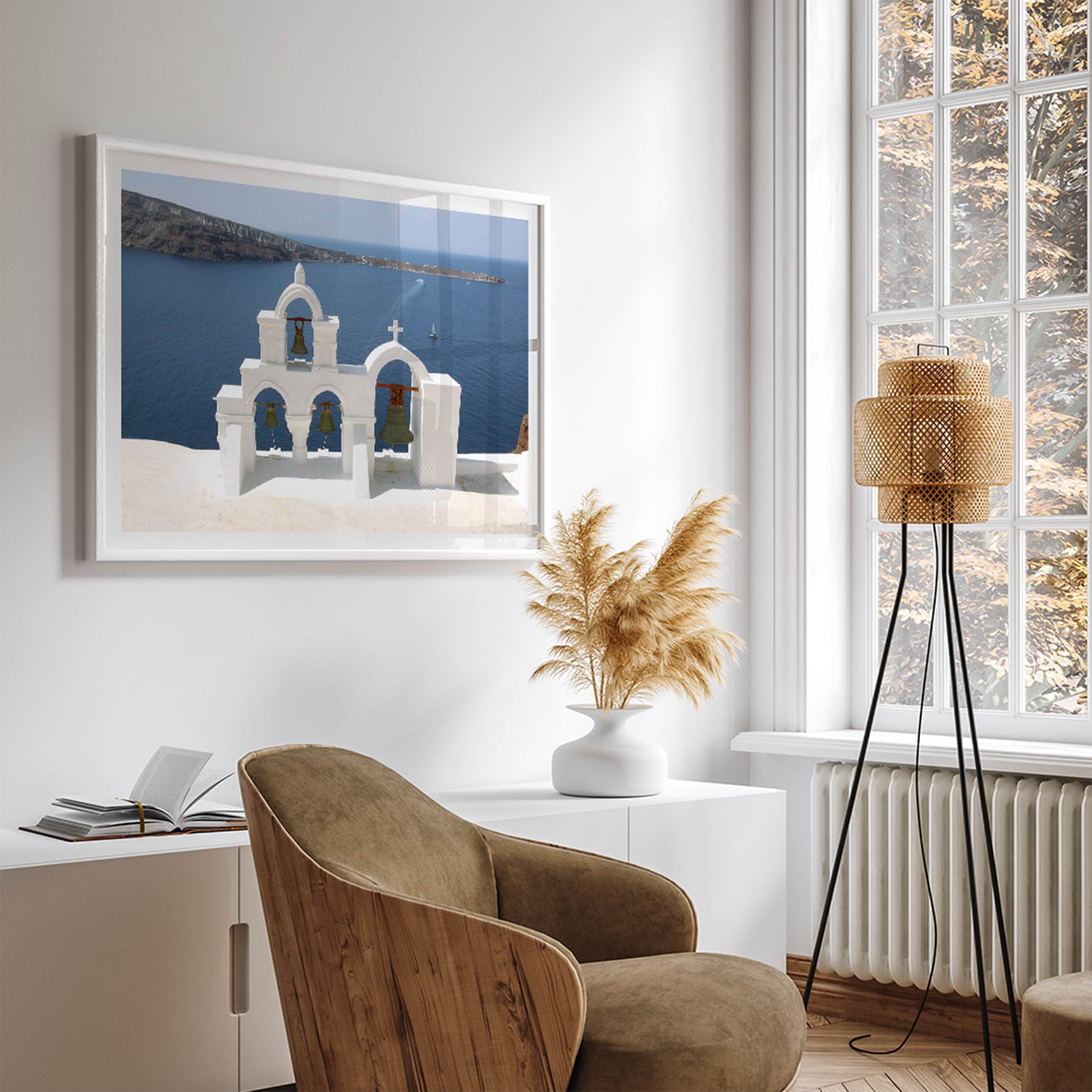 Santorini wall art featuring white church bell towers above the Aegean Sea in Santorini, Greece with volcanic cliffs and sailboats.