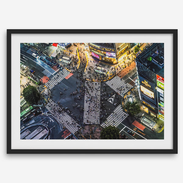 Shibuya Crossing print featuring an aerial Tokyo night scene with illuminated crosswalks and vibrant urban movement.