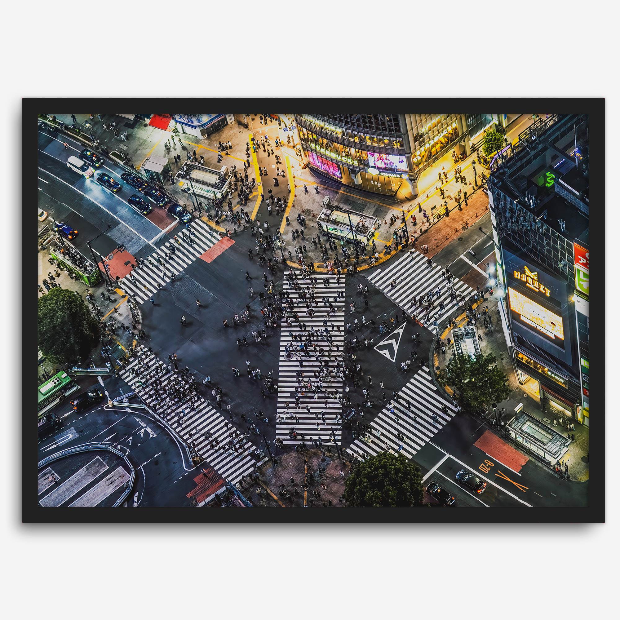Shibuya Crossing print featuring an aerial Tokyo night scene with illuminated crosswalks and vibrant urban movement.