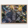 Shibuya Crossing print featuring an aerial Tokyo night scene with illuminated crosswalks and vibrant urban movement.