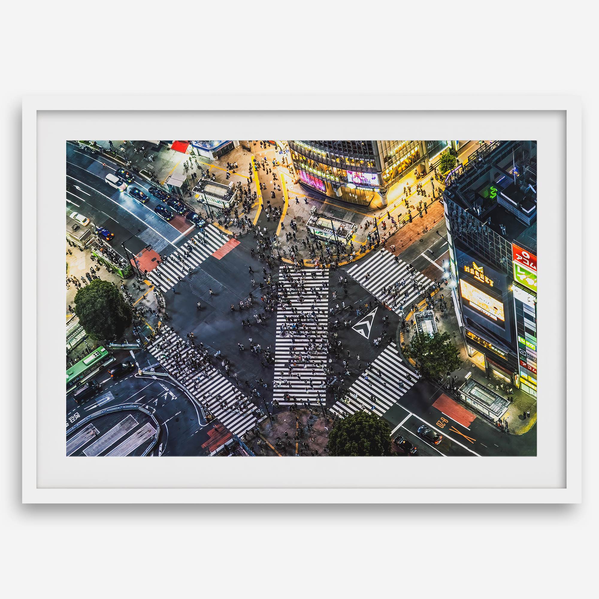 Shibuya Crossing print featuring an aerial Tokyo night scene with illuminated crosswalks and vibrant urban movement.