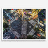 Shibuya Crossing print featuring an aerial Tokyo night scene with illuminated crosswalks and vibrant urban movement.