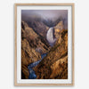 Painterly landscape photograph of the Grand Canyon of the Yellowstone with mist and waterfall.