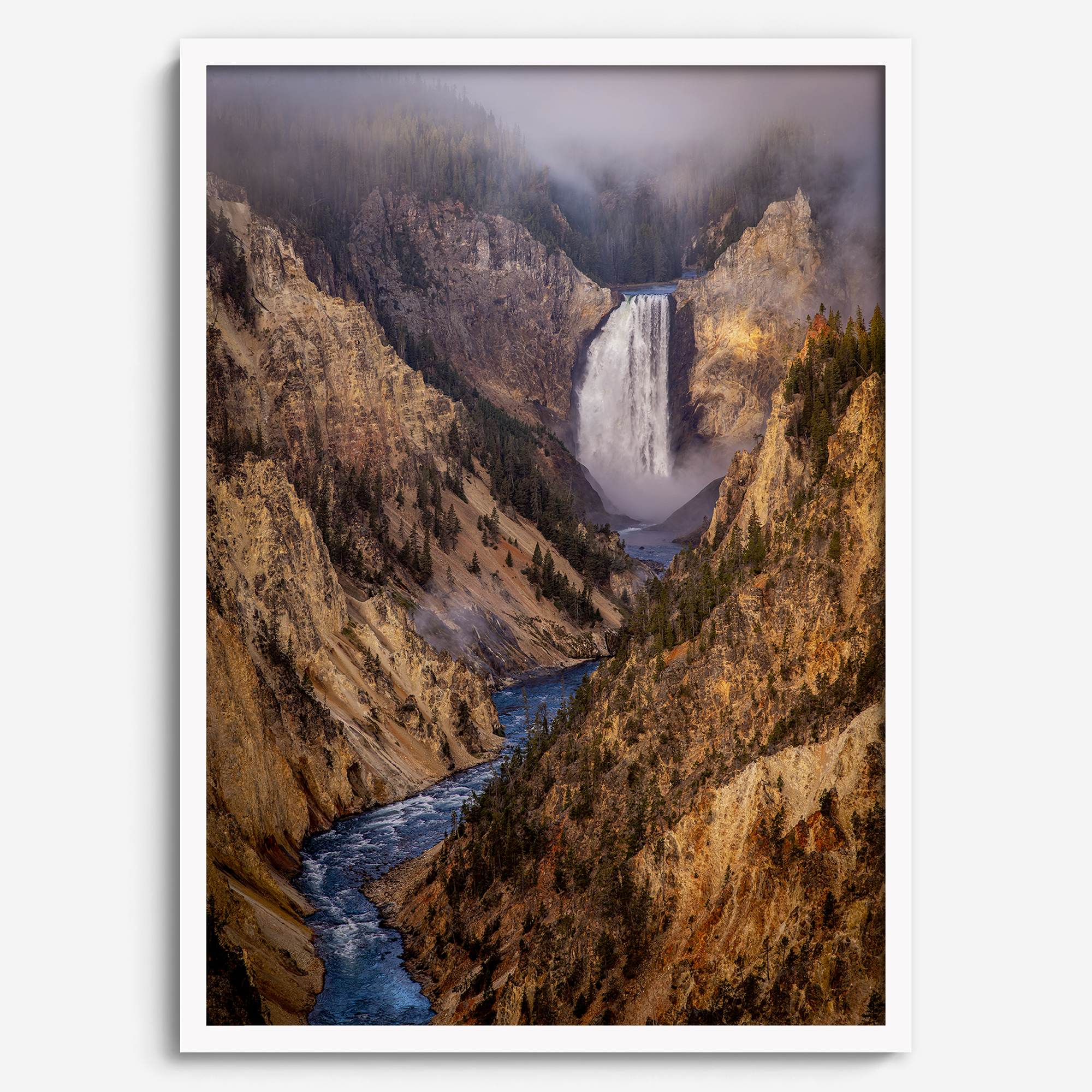 Painterly landscape photograph of the Grand Canyon of the Yellowstone with mist and waterfall.