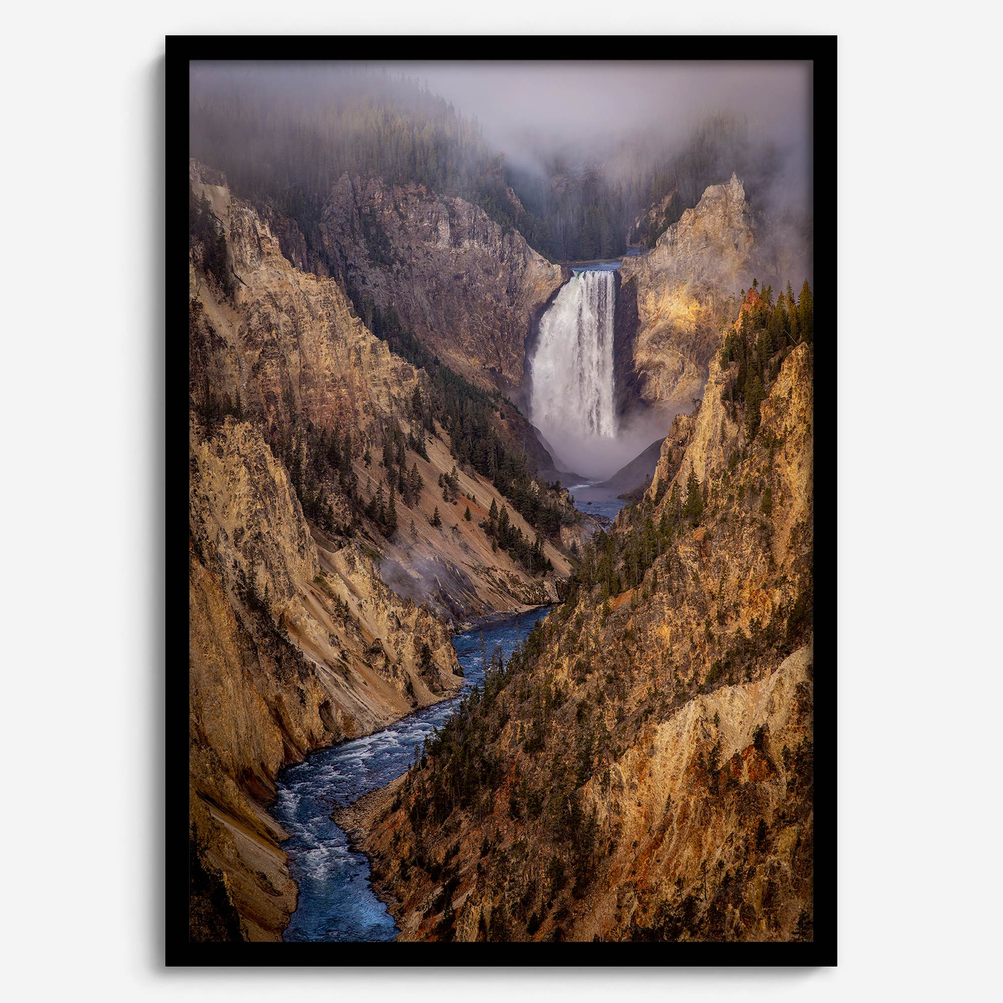 Painterly landscape photograph of the Grand Canyon of the Yellowstone with mist and waterfall.
