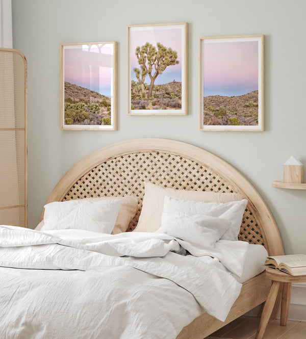 A wall art set of 3 framed or unframed Joshua Tree National Park prints. This desert wall art showcases a stunning Joshua Tree and the desert terrain and plants in a breathtaking Pink sunset filled with Pink and Purple hues. Modern gallery wall set