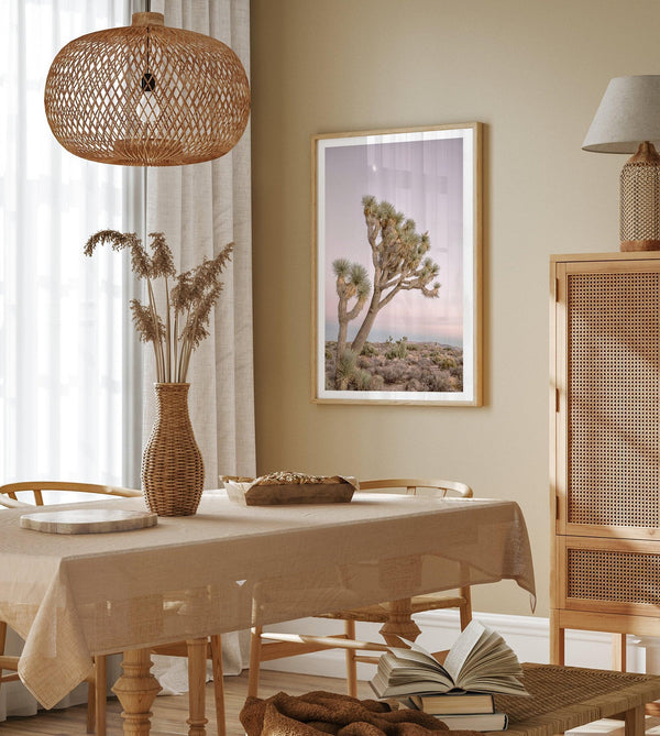 Joshua tree wall art featuring a pink desert sunset, with a tall Joshua tree silhouetted against the sky.