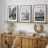 A San Francisco oversized set of 3 framed or unframed wall art. The prints feature a San Francisco cable car overlooking the Bay Bridge, the Golden Gate Bridge from Baker Beach, and the famous Painted Ladies with the San Francisco skyline.