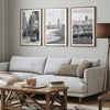 A San Francisco oversized set of 3 framed or unframed wall art. The prints feature a San Francisco cable car overlooking the Bay Bridge, the Golden Gate Bridge from Baker Beach, and the famous Painted Ladies with the San Francisco skyline.