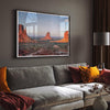 A fine art landscape photography print of a desert sunset over Monument Valley, located on the Arizona-Utah border. The warm and vibrant hues of this American Southwest sunset create a mesmerizing and awe-inspiring scene.