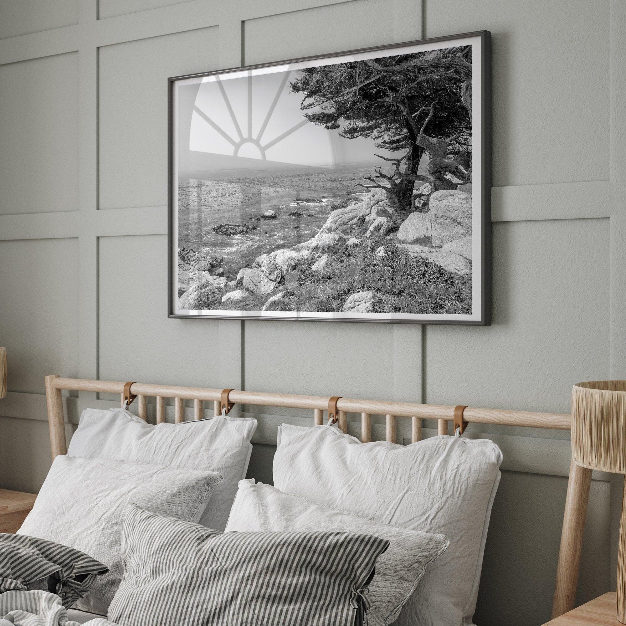 Black and white coastal art featuring Pebble Beach’s rocky shoreline and ocean view.