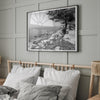 Black and white coastal art featuring Pebble Beach’s rocky shoreline and ocean view.