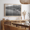 Tahoe Lake LifeA fine art black and white Lake Tahoe print showcasing docks and boats nested on the lake waters on the left, while the beachfront, nestled against a backdrop of a lush forest and majestic mountain, paints a picturesque scene on the right.