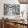 Snowy forest wall art with aerial photography of snow-covered trees in winter.
