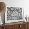 Snowy forest wall art with aerial photography of snow-covered trees in winter.
