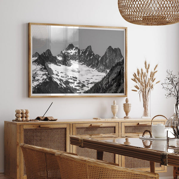 A minimalist black and white unframed or framed photo print of a snowy mountain range in North Cascades National Park, Washington State.